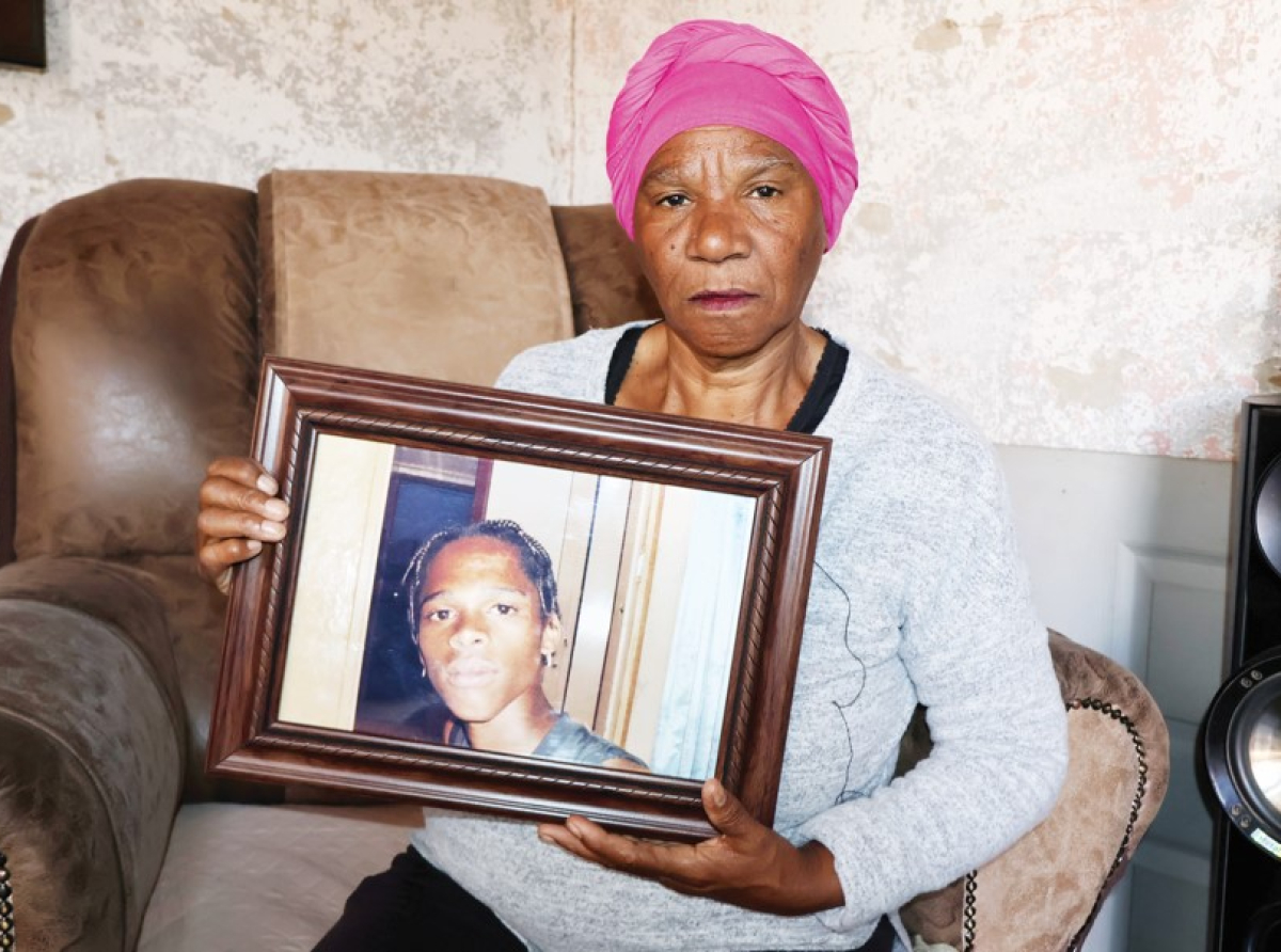 Brenda Ruiters holds a picture of her beloved son Picture: Baagedi Setlhora